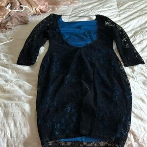 This dress is beautiful and has a low back! Fits good to size